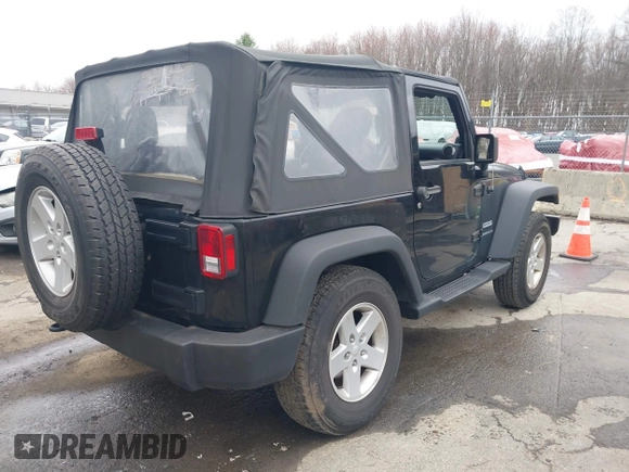 2014 Jeep Wrangler Sport with VIN 1C4AJWAG9EL312856, listed as a IAAI auction lot 42022870 with 98,323 mi miles and . Bid and sale history available at DreamBid. Image 4.