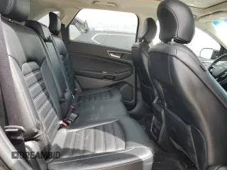 2019 Ford Edge SEL z VIN 2FMPK3J99KBB21856, wystawiony jako Copart lot #53104645 z przebiegiem 98 419 mil mil oraz Szkoda całkowita • Salvage title. Historia ofert i sprzedaży dostępna na DreamBid. Obrazek 11.