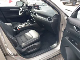 2025 Mazda CX-5 2.5 S Preferred Package with VIN JM3KFBCL1S0601601, listed as a IAAI auction lot 42135173 with 2,392 mi miles. Bid and sale history available at carsss.com. Image 5.