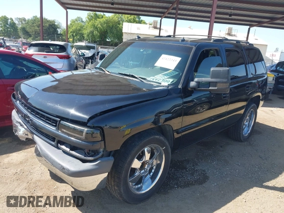 2003 Chevrolet Tahoe LS z VIN 1GNEC13T53J331221, wystawiony jako IAAI lot #42422243 z przebiegiem Nie podano mil oraz . Historia ofert i sprzedaży dostępna na DreamBid. Obrazek 2.