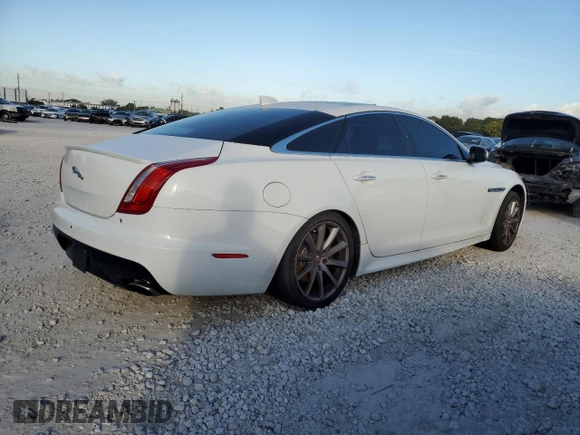 2018 Jaguar XJ with VIN SAJWA1C77J8W14750, listed as a Copart auction lot 87273204 with 51,040 mi miles and Clean Title. Bid and sale history available at carsss.com. Image 3.