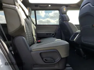 2023 Rivian R1S Adventure with VIN 7PDSGBBA3PN017791, listed as a Copart auction lot 82397374 with 20,733 mi miles and Salvage Title. Bid and sale history available at carsss.com. Image 12.