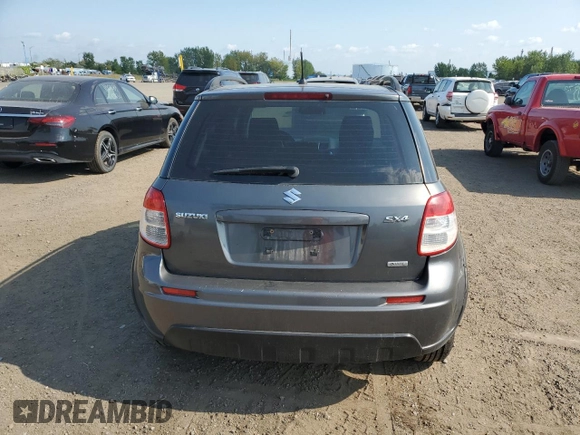 2010 Suzuki SX4 with VIN JS2YB5A24A6300249, listed as a Copart auction lot 71565394 with 291,886 mi miles and Salvage Title. Bid and sale history available at DreamBid. Image 6.