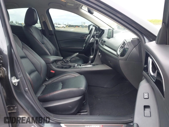 2014 Mazda 3 S Touring with VIN JM1BM1V31E1132448, listed as a IAAI auction lot 41815085 with 144,705 mi miles and . Bid and sale history available at DreamBid. Image 5.