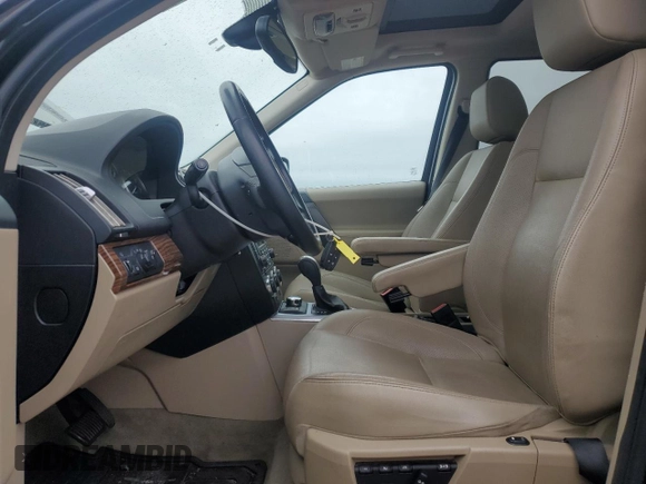 2010 Land Rover LR2 HSE with VIN SALFR2BNXAH195394, listed as a Copart auction lot 58481695 with 143,218 mi miles and Salvage title. Bid and sale history available at DreamBid. Image 7.