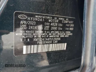 2023 Genesis G70 2.0T with VIN KMTG34TA4PU126996, listed as a Copart auction lot 69326704 with 24,882 mi miles and Non Repairable. Bid and sale history available at DreamBid. Image 13.