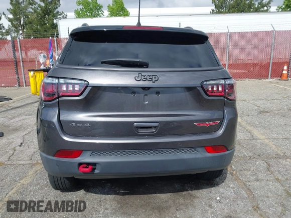 2021 Jeep Compass Trailhawk with VIN 3C4NJDDB6MT561074, listed as a IAAI auction lot 42125886 with 77,293 mi miles and . Bid and sale history available at DreamBid. Image 17.