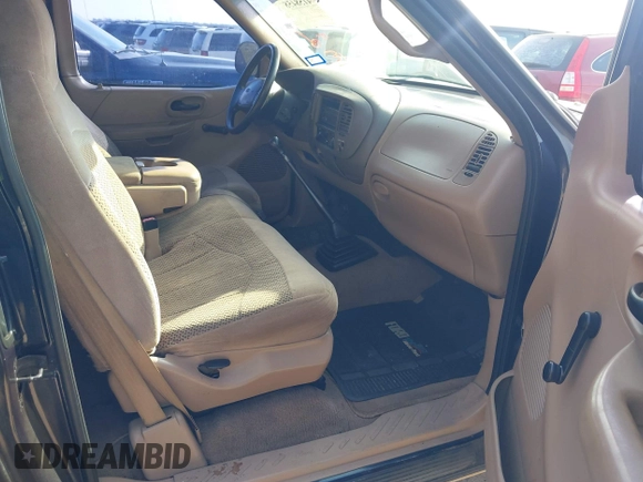 1999 Ford F-150 with VIN 1FTZX1724XKA57395, listed as a IAAI auction lot 41584584 with 171,342 mi miles and . Bid and sale history available at DreamBid. Image 5.