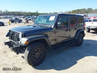 2024 Jeep Wrangler Willys with VIN 1C4PJXDNXRW125950, listed as a IAAI auction lot 41497980 with 26,574 mi miles. Bid and sale history available at carsss.com. Image 2.