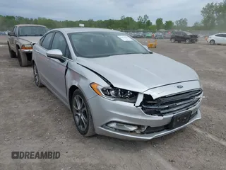 2017 Ford Fusion SE z VIN 3FA6P0H78HR342269, wystawiony jako IAAI lot #42274128 z przebiegiem 94 130 mil mil oraz . Historia ofert i sprzedaży dostępna na DreamBid. Obrazek 1.