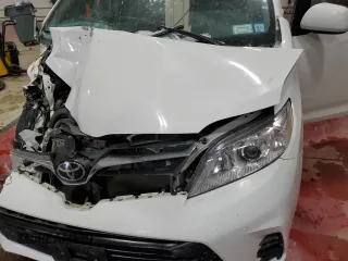 2019 Toyota Sienna LE with VIN 5TDJZ3DC0KS219184, listed as a Copart auction lot 88026925 with 127,430 mi miles and Salvage Title. Bid and sale history available at carsss.com. Image 12.