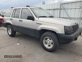 1995 Jeep Grand Cherokee Laredo with VIN 1J4GZ58S2SC703196, listed as a Copart auction lot 68571944 with 264,876 mi miles and Clean Title. Bid and sale history available at carsss.com. Image 4.