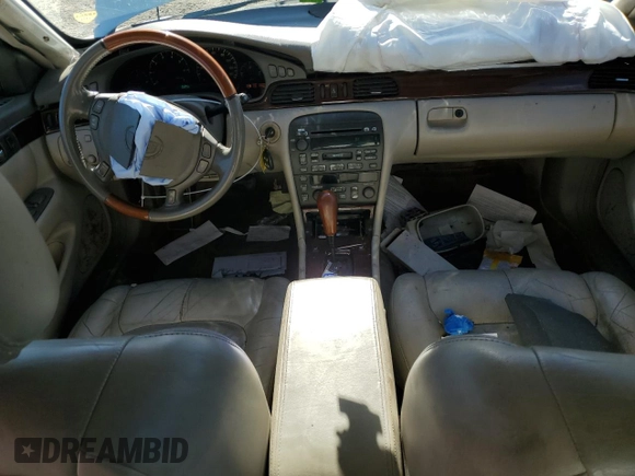 2003 Cadillac Seville Luxury SLS z VIN 1G6KS54Y13U261492, wystawiony jako Copart lot #80113764 z przebiegiem 184 880 mil mil oraz Szkoda całkowita • Salvage title. Historia ofert i sprzedaży dostępna na DreamBid. Obrazek 8.