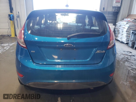 2016 Ford Fiesta SE with VIN 3FADP4EJ2GM108056, listed as a Copart auction lot 45015145 with 123,418 mi miles and Salvage Title. Bid and sale history available at DreamBid. Image 6.