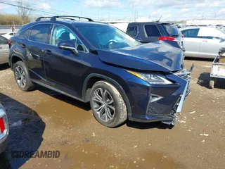 2016 Lexus RX 350 with VIN 2T2BZMCA2GC004895, listed as a IAAI auction lot 41859749 with 104,370 mi miles and . Bid and sale history available at DreamBid. Image 1.