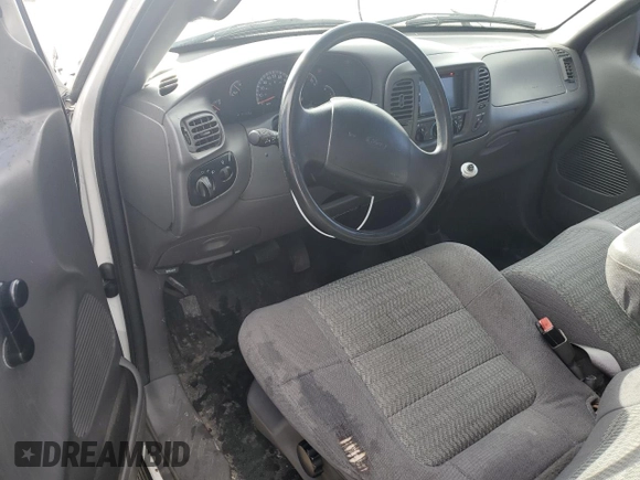 2002 Ford F-150 XL with VIN 1FTRF17212KC06180, listed as a Copart auction lot 45336625 with 214,139 mi miles and Salvage title. Bid and sale history available at DreamBid. Image 8.