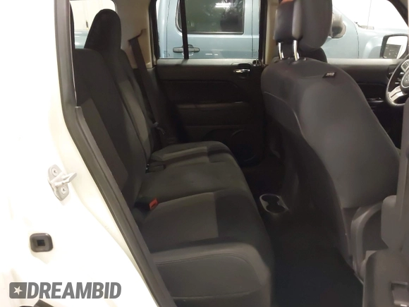 2014 Jeep Patriot Latitude with VIN 1C4NJPFB8ED717749, listed as a IAAI auction lot 41962155 with 147,755 mi miles and . Bid and sale history available at carsss.com. Image 8.