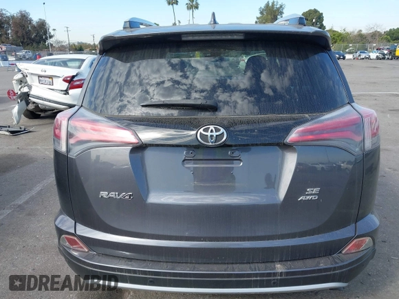 2016 Toyota RAV4 SE with VIN JTMJFREV8GJ087419, listed as a IAAI auction lot 41680315 with 93,298 mi miles and . Bid and sale history available at DreamBid. Image 16.