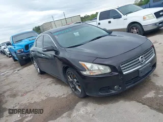 2014 Nissan Maxima S with VIN 1N4AA5AP3EC911798, listed as a IAAI auction lot 41842528 with 124,030 mi miles and . Bid and sale history available at DreamBid. Image 1.