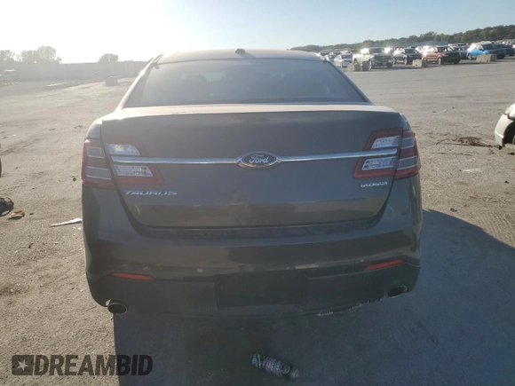 2015 Ford Taurus SE with VIN 1FAHP2D80FG116704, listed as a Copart auction lot 73571034 with 85,665 mi miles and Salvage Title. Bid and sale history available at DreamBid. Image 6.