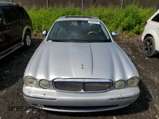 2006 Jaguar XJ Vanden Plas z VIN SAJWA82B46SG49807, wystawiony jako Copart lot #58930685 z przebiegiem 116 710 mil mil oraz Szkoda całkowita • Salvage title. Historia ofert i sprzedaży dostępna na DreamBid. Obrazek 5.