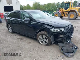 2018 Audi Q7 Premium Plus z VIN WA1LHAF7XJD049338, wystawiony jako IAAI lot #42286676 z przebiegiem 103 462 mil mil oraz . Historia ofert i sprzedaży dostępna na DreamBid. Obrazek 1.