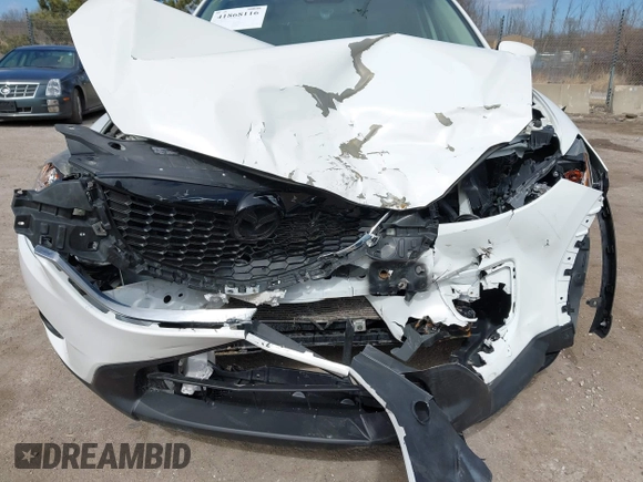2014 Mazda CX-5 Grand Touring with VIN JM3KE4DY8E0397330, listed as a IAAI auction lot 41868116 with 180,891 mi miles. Bid and sale history available at carsss.com. Image 6.