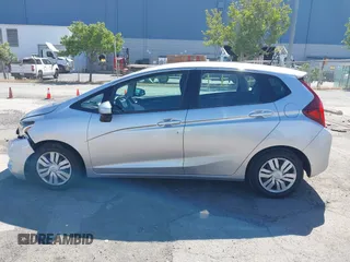 2015 Honda Fit LX z VIN 3HGGK5H51FM750102, wystawiony jako IAAI lot #42278830 z przebiegiem 121 855 mil mil oraz . Historia ofert i sprzedaży dostępna na DreamBid. Obrazek 14.