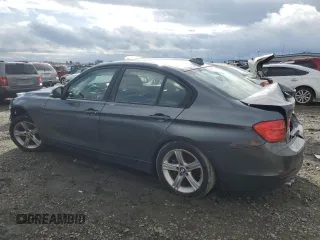2014 BMW 3 Series 328i with VIN WBA3C1C50EK114784, listed as a Copart auction lot 49279505 with 128,652 mi miles and Salvage Title. Bid and sale history available at carsss.com. Image 2.