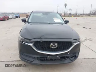 2017 Mazda CX-5 Grand Touring with VIN JM3KFADL9H0110985, listed as a IAAI auction lot 41435143 with 88,208 mi miles. Bid and sale history available at carsss.com. Image 6.