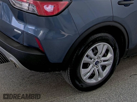 2020 Ford Escape S with VIN 1FMCU0F69LUB83596, listed as a IAAI auction lot 42733966 with 76,461 mi miles and . Bid and sale history available at DreamBid. Image 11.