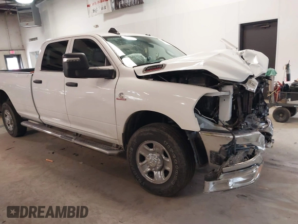 2023 Ram 2500 Tradesman z VIN 3C6UR5HL0PG529660, wystawiony jako IAAI lot #41491722 z przebiegiem 43 672 mil mil oraz . Historia ofert i sprzedaży dostępna na DreamBid. Obrazek 1.
