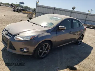 2014 Ford Focus SE with VIN 1FADP3F2XEL429715, listed as a Copart auction lot 69993084 with 118,657 mi miles and Clean Title. Bid and sale history available at carsss.com. Image 1.
