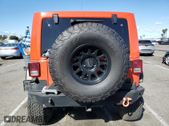 2015 Jeep Wrangler Unlimited Rubicon with VIN 1C4BJWFG7FL719038, listed as a Copart auction lot 51507205 with 62,664 mi miles and Salvage Title. Bid and sale history available at carsss.com. Image 6.