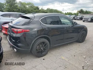 2018 Alfa Romeo Stelvio z VIN ZASFAKAN1J7B92901, wystawiony jako Copart lot #56943405 z przebiegiem 78 444 mil mil oraz Czysty tytuł • Clean title. Historia ofert i sprzedaży dostępna na DreamBid. Obrazek 3.