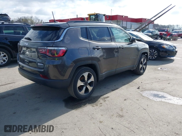 2017 Jeep Compass Latitude with VIN 3C4NJCBB4HT632758, listed as a IAAI auction lot 41849009 with 58,246 mi miles and . Bid and sale history available at DreamBid. Image 4.