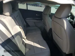 2019 Cadillac XT4 FWD Luxury z VIN 1GYAZAR44KF143890, wystawiony jako Copart lot #53096255 z przebiegiem 150 740 mil mil oraz Szkoda całkowita • Salvage title. Historia ofert i sprzedaży dostępna na DreamBid. Obrazek 11.