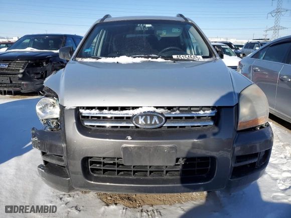 2007 Kia Sportage LX with VIN KNDJF724677426143, listed as a Copart auction lot 45154645 with 211,441 mi miles and Salvage Title. Bid and sale history available at carsss.com. Image 5.