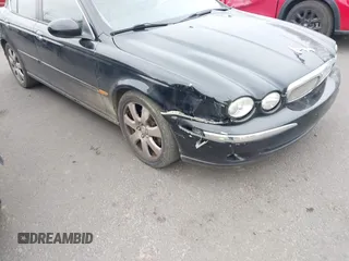 2006 Jaguar X-Type with VIN SAJWA51A16WE68650, listed as a IAAI auction lot 41461291 with 135,332 mi miles and . Bid and sale history available at DreamBid. Image 12.