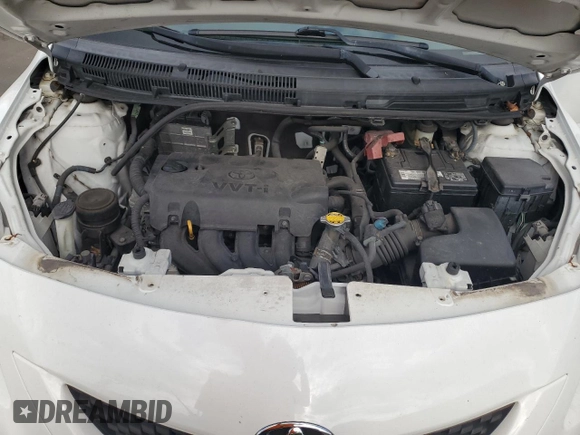 2012 Toyota Yaris z VIN JTDBT4K35CL017457, wystawiony jako Copart lot #58820985 z przebiegiem 120 901 mil mil oraz Szkoda całkowita • Salvage title. Historia ofert i sprzedaży dostępna na DreamBid. Obrazek 11.