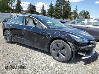 2020 Tesla Model 3 Long Range z VIN 5YJ3E1EBXLF795689, wystawiony jako Copart lot #56703555 z przebiegiem 62 556 mil mil oraz Szkoda całkowita • Salvage title. Historia ofert i sprzedaży dostępna na DreamBid. Obrazek 4.