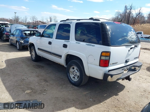 2005 Chevrolet Tahoe LS with VIN 1GNEK13T65J198121, listed as a IAAI auction lot 41826459 with 233,718 mi miles and . Bid and sale history available at DreamBid. Image 3.