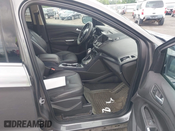 2013 Ford Escape Titanium with VIN 1FMCU0J92DUB36428, listed as a IAAI auction lot 42144682 with 263,600 mi miles and . Bid and sale history available at carsss.com. Image 5.