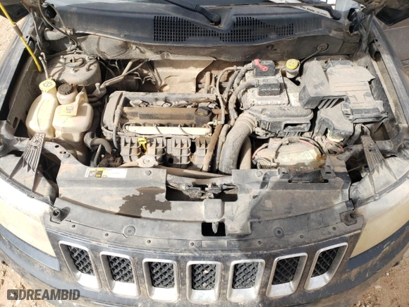 2014 Jeep Compass Sport with VIN 1C4NJCBA6ED573849, listed as a Copart auction lot 47001505 with 259,846 mi miles and Salvage Title. Bid and sale history available at carsss.com. Image 14.