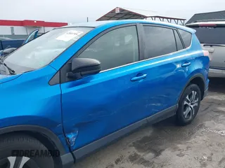 2018 Toyota RAV4 LE with VIN JTMBFREV8JJ220630, listed as a IAAI auction lot 42001795 with 86,027 mi miles. Bid and sale history available at carsss.com. Image 17.