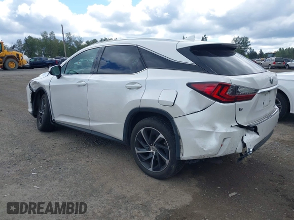 2016 Lexus RX 350 with VIN 2T2ZZMCA1GC009908, listed as a IAAI auction lot 42314574 with 126,956 mi miles and . Bid and sale history available at DreamBid. Image 3.