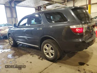 2013 Dodge Durango Crew with VIN 1C4RDJDG2DC663518, listed as a Copart auction lot 62736515 with 226,720 mi miles and Salvage title. Bid and sale history available at DreamBid. Image 2.