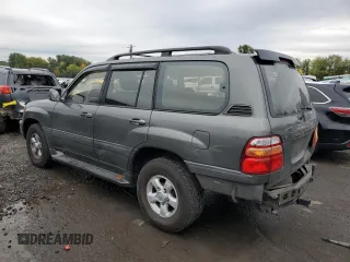 2000 Toyota Land Cruiser with VIN JT3HT05J7Y0084006, listed as a Copart auction lot 76390254 with 142,620 mi miles and Salvage Title. Bid and sale history available at carsss.com. Image 2.