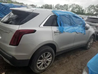 2020 Cadillac XT5 Premium Luxury FWD with VIN 1GYKNCRS4LZ123097, listed as a Copart auction lot 44147615 with 168,963 mi miles and Clean title. Bid and sale history available at DreamBid. Image 3.