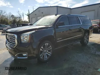 2019 GMC Yukon XL Denali with VIN 1GKS2HKJ9KR264134, listed as a Copart auction lot 43138545 with 105,690 mi miles and Salvage Title. Bid and sale history available at carsss.com. Image 1.